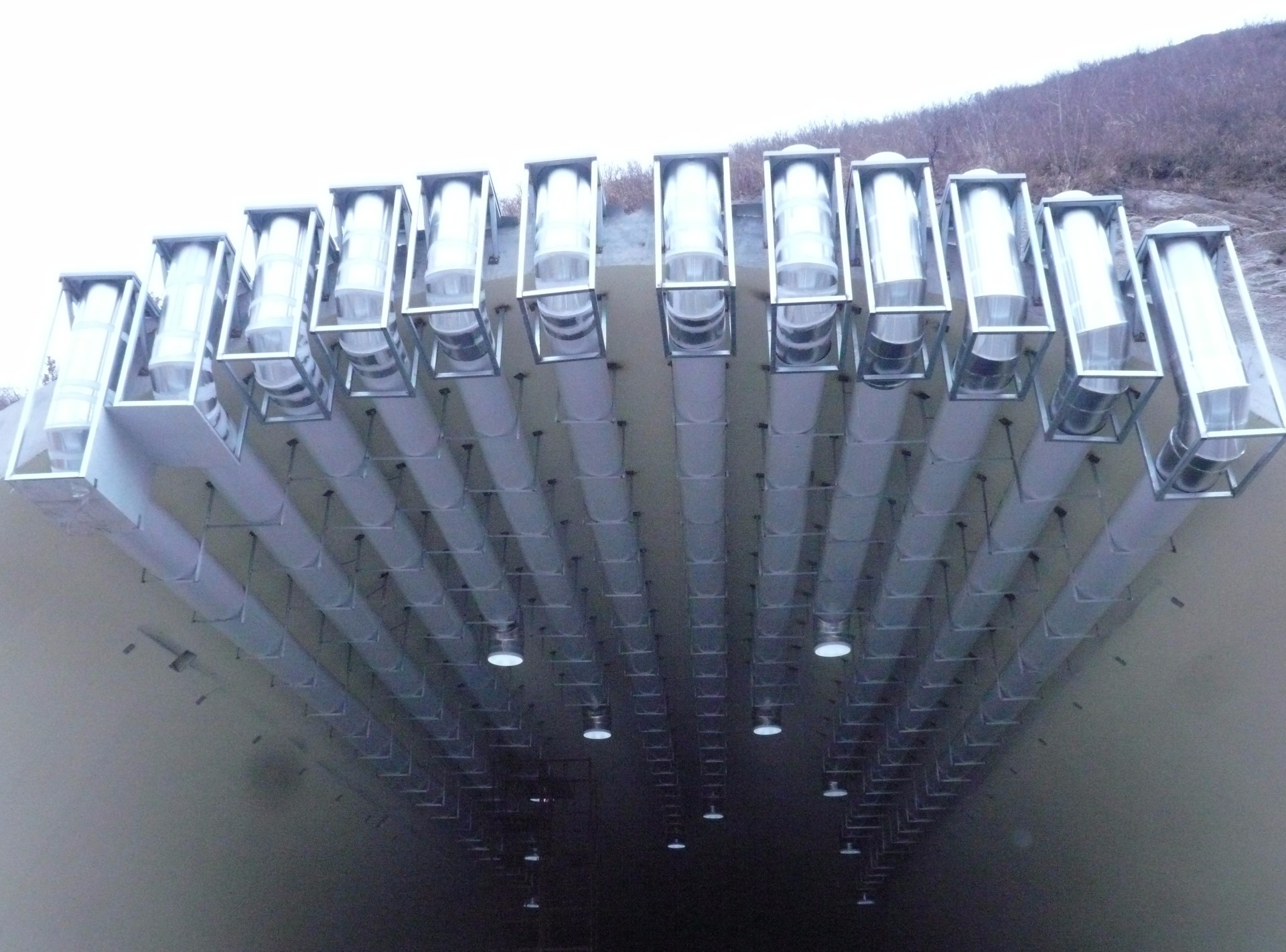 Solatube Daylighting Systems funneling sunlight into a dark tunnel
